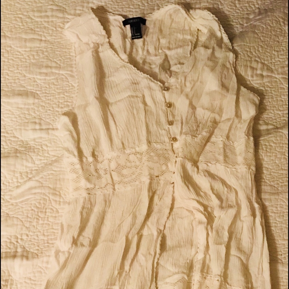 A cream long dress that open on your stomach